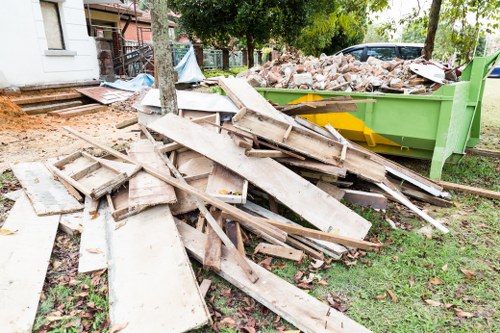 Professional team conducting loft clearance in a Tower Hamlets home